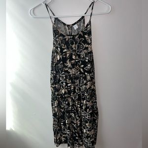 Black with beige flowers Romper